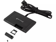 Black electronic device with cable and small components on a white background