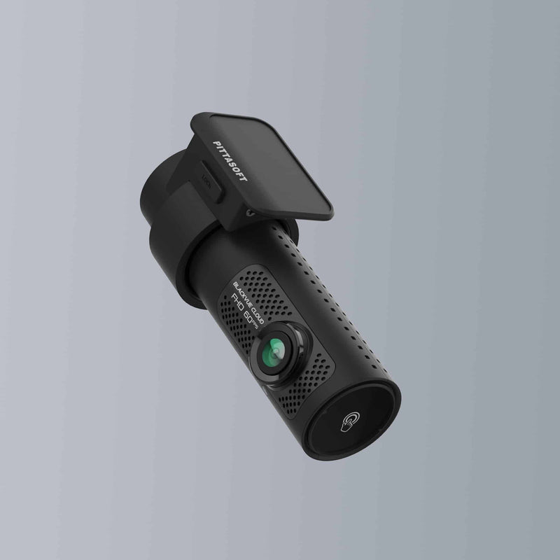 Black car dashboard camera on a gray background