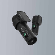 Black dual-camera device on a gray background