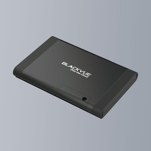 A black BlackVue CM100 LTE connectivity module for dash cams.